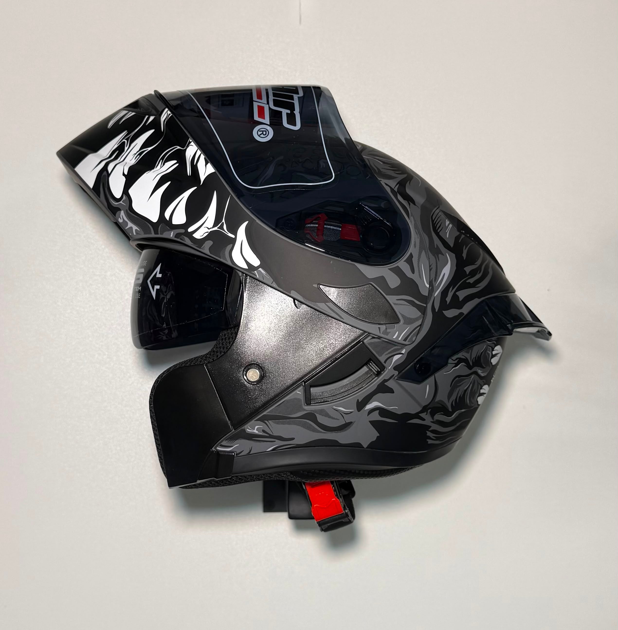 Super Air SP-002 Tatsu Black helmet top view with fang and beast eye graphic
